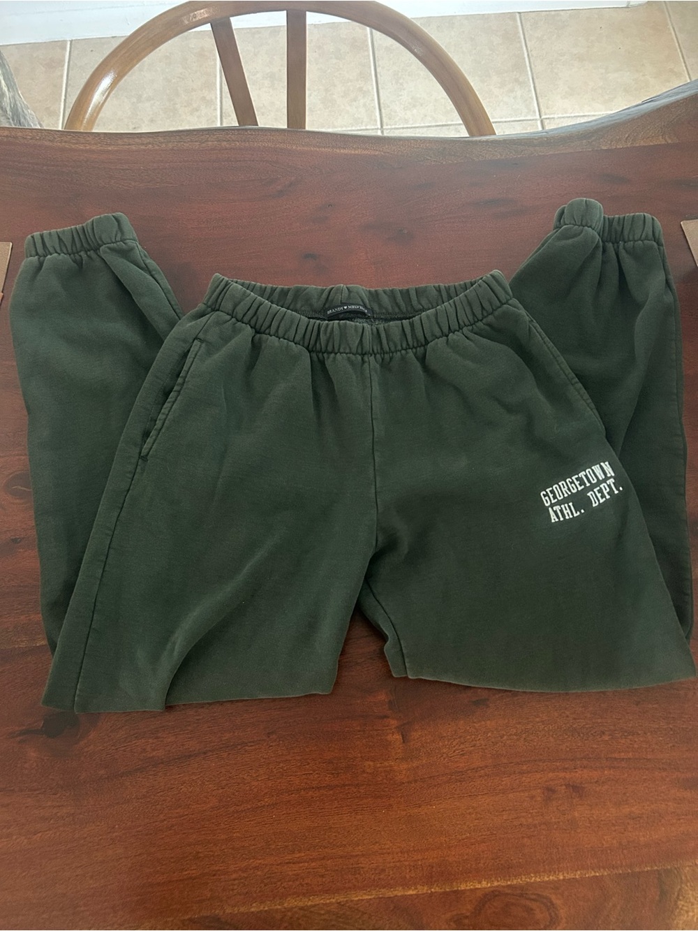 Brandy Melville Olive Green Sweatpants with White Georgetown Print